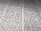 Close up of a dictionary page with dozens of definitions for the word 'get'